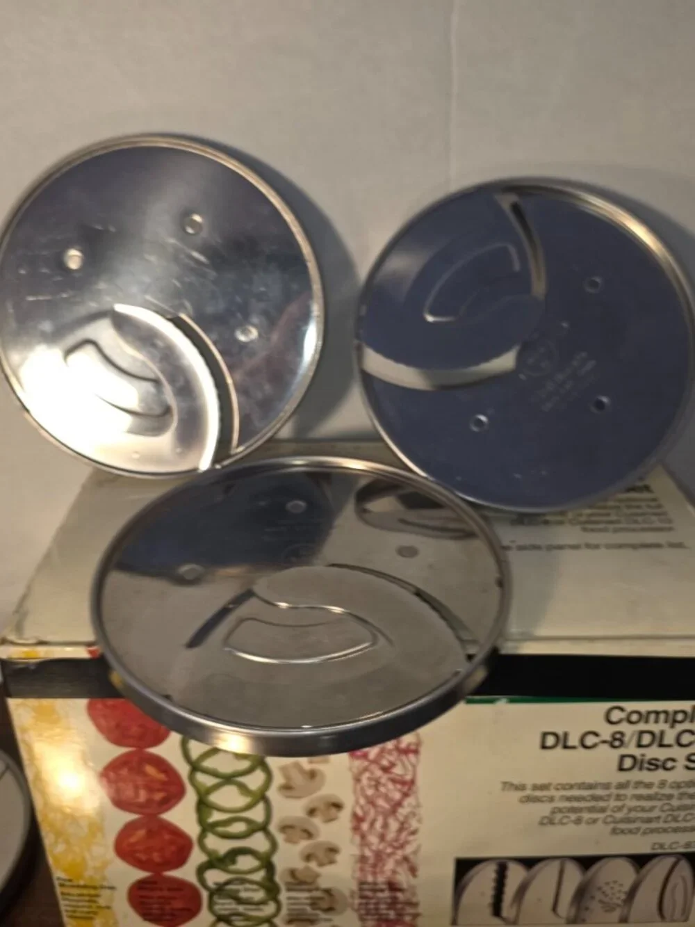 Cuisinart DLC-8 / DLC-10 accessory set containing multiple stainless steel